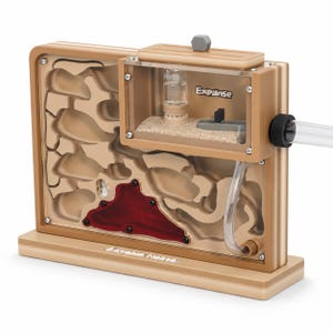 May include: A tan ant farm with a clear viewing window and a red section. The ant farm has a clear tube extending from the side. The word "Expanse" is printed on the front. The ant farm is on a light tan base.