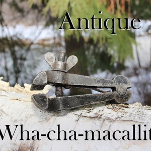 Antique Reversible Wha-Cha-Macallit Clamp
