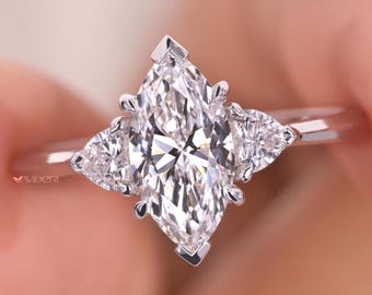 Pierścionek zaręczynowy z diamentem Marquise Lab Grown z certyfikatem IGI: akcenty w kształcie serca z białego złota