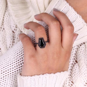 Black moissanite ring with an edgy, sophisticated touch for your loved one.