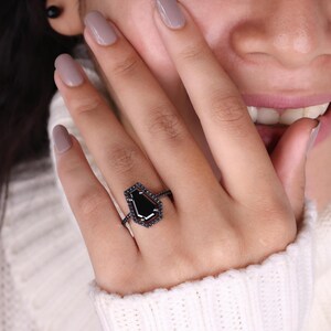 Coffin cut ring featuring a unique design and striking elegance.
