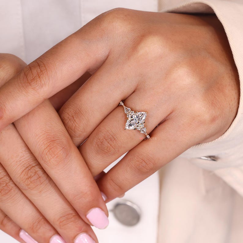Tapered shank marquise ring in Muse setting.
