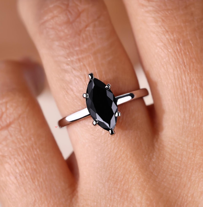 Avideri ring with marquise moissanite for a luxurious, timeless design.