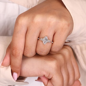 Custom engagement ring with marquise center.