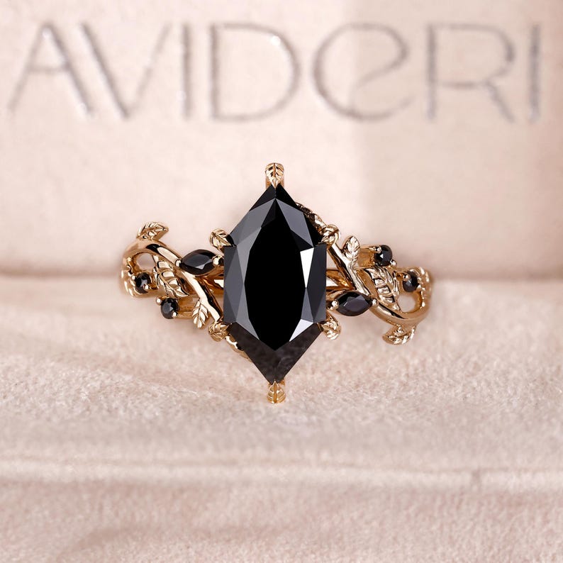 Dutch marquise engagement ring with black stone engagement ring.