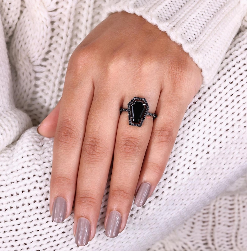 Pave ring with intricate, dazzling diamonds covering the band for extra sparkle.