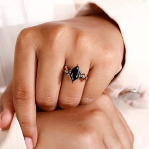 Custom engagement ring in moissanite engagement ring design.