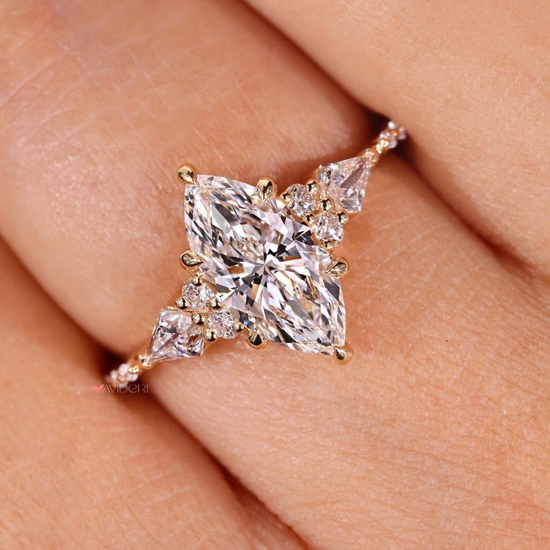Round side diamond ring with prong setting.