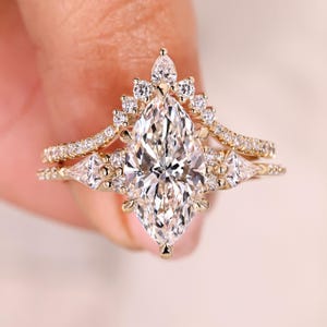 Pave style marquise ring with kite stones.