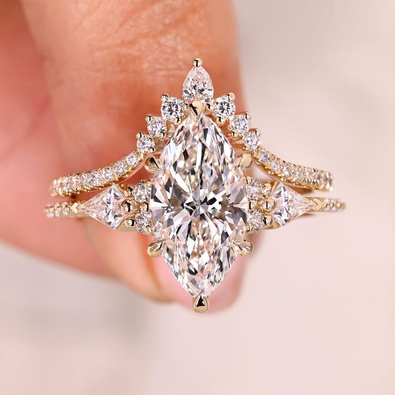 Pave style marquise ring with kite stones.