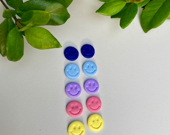 Smiley face studs
