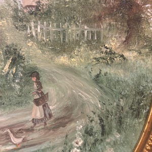May include: A painting depicting a girl walking along a path with a basket in her hand. Two ducks are in front of her and a white picket fence can be seen in the background. The painting is framed in a gold frame.