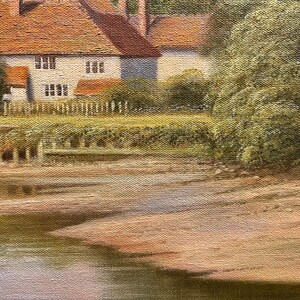 May include: A painting of a quaint cottage with a brown roof and white walls, nestled beside a river. The cottage has a small garden with a white picket fence. The river is calm and reflects the sky and trees. The painting is done in a realistic style with soft brushstrokes.