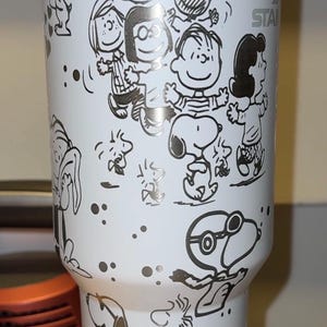 40oz laser engraved “peanuts” tumbler