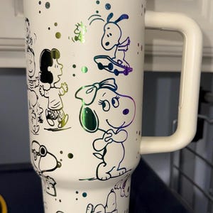 Laser Engraved "Peanuts", 24oz/32oz Water bottle and 40oz Stainless Steel tumbler cream w/rainbow