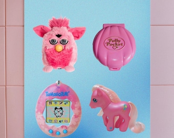 May include: A pink Furby, a pink Polly Pocket, a pink Tamagotchi, and a pink My Little Pony on a light blue background.