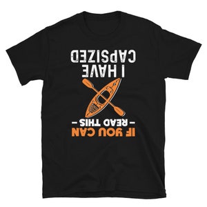 May include: Black t-shirt with white text that reads "If you can read this I have capsized". The text is surrounded by a graphic of an orange kayak with paddles.