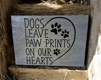 dogs leave paw prints on our hearts wood sign