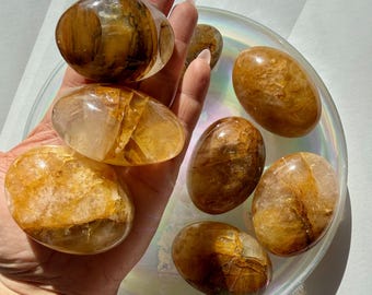 Golden Healer Palmstone | Included Quartz Palm Stone