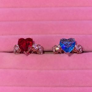 Red and hotsell blue engagement ring
