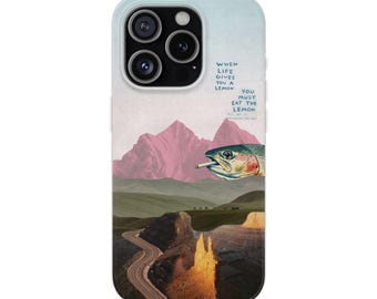 May include: A smartphone case featuring a surreal collage of pink mountains, a winding road, and a fish with a cigarette in its mouth. The text reads: WHEN LIFE GIVES YOU A LEMON YOU MUST EAT THE LEMON ALL OF IT INCLUDING THE PEEL.