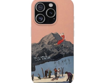 May include: A peach-colored phone case featuring a collage of a mountain landscape with a person in a red outfit sitting on a peak. The text "SILLY GIRLS LIVE FOREVER" is printed on the left. Below, several figures are skiing on a blue snowy slope.