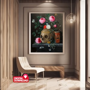 May include: A framed digital download of a still life painting featuring a skull adorned with a gold crown, surrounded by pink and white roses, butterflies, and a small red and gold container. The artwork is displayed in a modern interior setting.