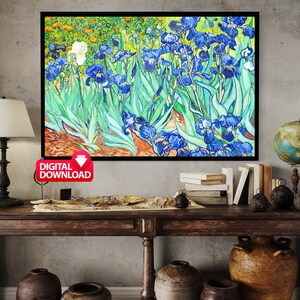 May include: A digital download of a painting of blue irises with green leaves and a white iris in the background. The painting is in a style reminiscent of Vincent van Gogh.