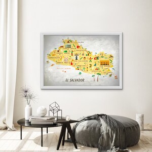 May include: A colorful illustrated map of El Salvador with the names of major cities and towns, including Santa Ana, San Salvador, and San Miguel. The map is on a yellow background with a silver frame.