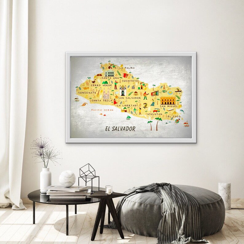 May include: A colorful illustrated map of El Salvador with the names of major cities and towns, including Santa Ana, San Salvador, and San Miguel. The map is on a yellow background with a silver frame.