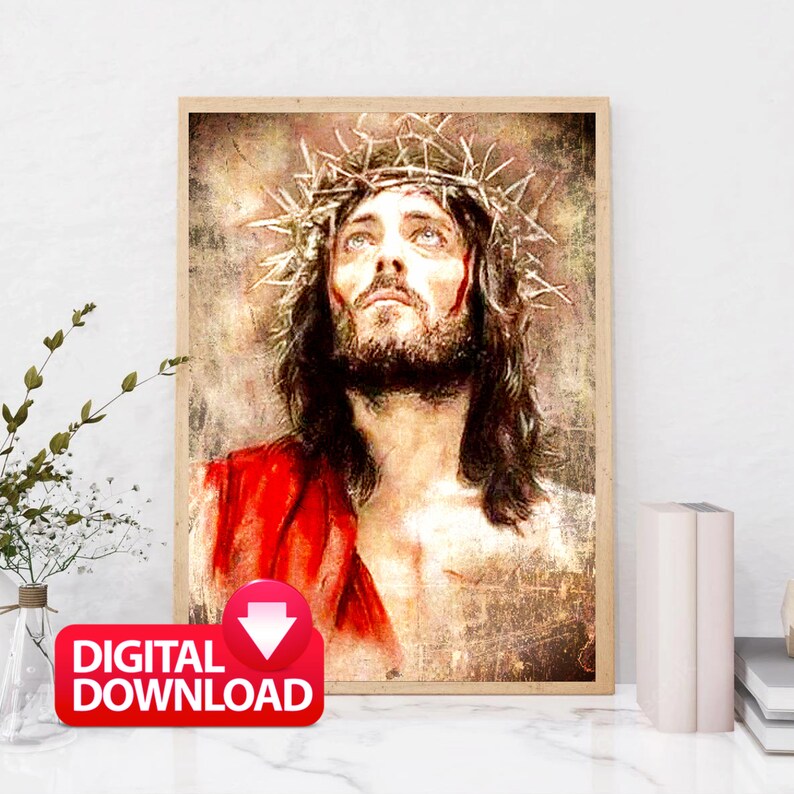 Op de afbeelding: Een digitale download van een schilderij dat Jezus Christus afbeeldt met een doornenkroon. Het schilderij is in vintage stijl met een rood, bruin en wit kleurenschema.