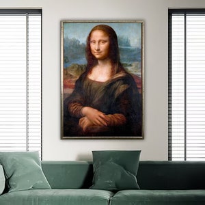 May include: A framed painting of the Mona Lisa, a famous portrait by Leonardo da Vinci. The painting depicts a woman with a soft smile, wearing a dark dress and a light background.