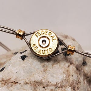 45 ACP Gehäuse und Gitarrensaiten Unisex Armband