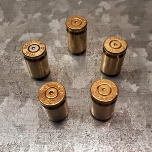 Set of 5 Bullet Brass Magnets Made with Recycled Casings of 308 Caliber top view
