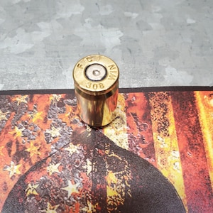 Bullet Brass Magnets Made with Recycled Casings of 308 Caliber holding card