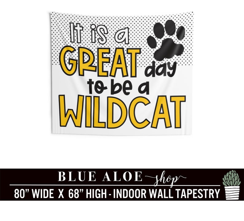 May include: White tapestry with black polka dots and a black paw print. It reads "It is a GREAT day to be a WILDCAT". The tapestry is 80 inches wide and 68 inches high.