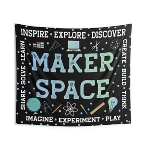 May include: Black and white wall tapestry with the text "Maker Space" in blue and green. The tapestry is decorated with small blue dots and various icons related to creativity and learning, including a globe, a lightbulb, a ruler, a compass, a paint palette, scissors, a laptop, and building blocks. The text around the main text reads "Inspire, Explore, Discover, Create, Build, Think, Share, Solve, Learn, Imagine, Experiment, Play."