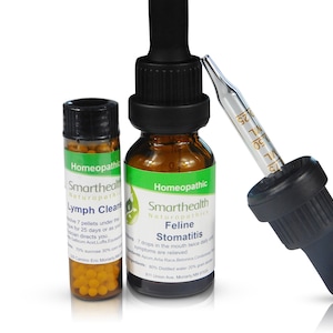May include: Two bottles of homeopathic remedies for pets. The bottle on the left is labeled "Lymph Cleanse" and contains small yellow pellets. The bottle on the right is labeled "Feline Stomatitis" and has a dropper.