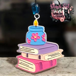 May include: A set of three ceramic mugs with a speckled, matte finish. The mugs are in shades of cream, light gray, and dark gray. Each mug has a simple, minimalist design, perfect for coffee or tea.