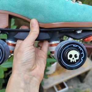 VARIOUS DESIGNS - roller skates axle nut covers/wheel caps (set of 4)