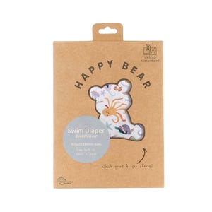 May include: A brown cardboard box with a white bear illustration and the text "HAPPY BEAR" on the front. The box contains a swim diaper with an underwater sea life print. The text "Swim Diaper" and "Zwemluier" is printed on the box. The text "Adjustable in size from birth to about 3 years" is also printed on the box.