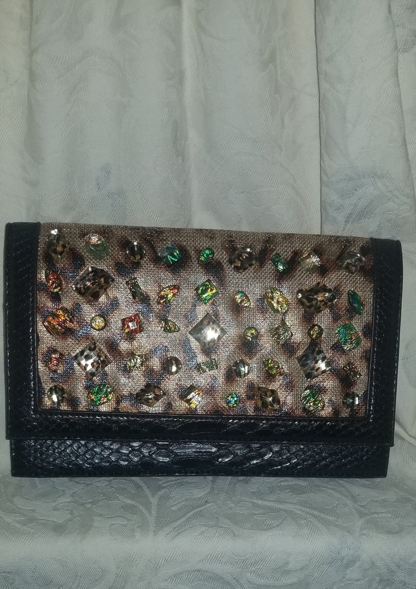Christian audigier deals clutch
