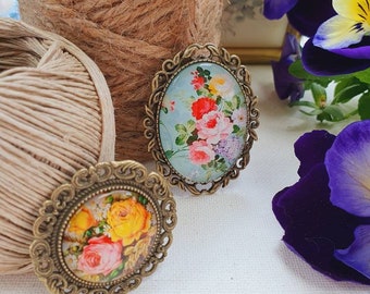 Vintage metal brooches with flower cabochons, shabby-chic