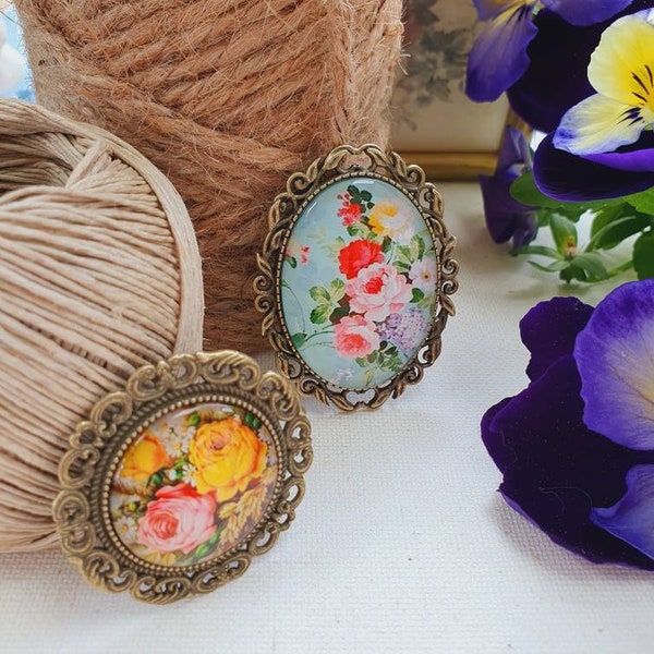 Vintage metal brooches with flower cabochons, shabby-chic