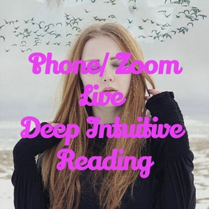 May include: A woman with long auburn hair and a black top. The image has text in pink that reads "Phone/Zoom Live Deep Intuitive Reading". A flock of birds flies in the background.