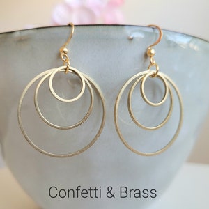 Earrings with 3 golden stainless steel rings and stainless steel ear hooks image 1