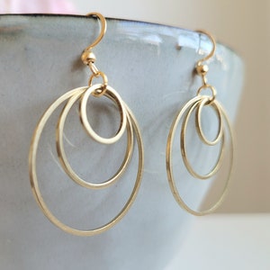 Earrings with 3 golden stainless steel rings and stainless steel ear hooks image 5