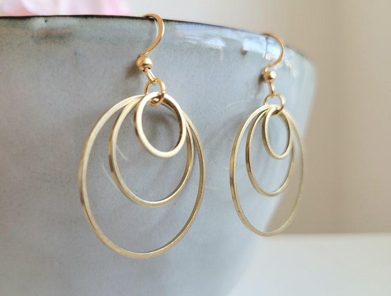 Earrings with 3 golden stainless steel rings and stainless steel ear hooks image 5