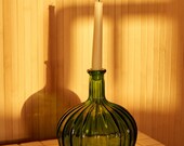 Green glass vase candle holder