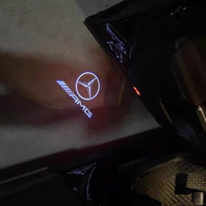 2 X projecteurs de lumière de porte de voiture à LED, kit de courtoisie en nanoverre de flaque d'eau de logo pour la classe Mercedes Benz Kit ultra lumineux Cette image ne s'estompe JAMAIS AMG WITH STAR